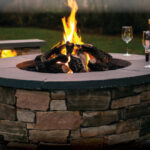 custom fire pit by DiSabatino Landscaping