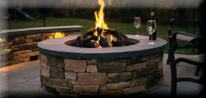 custom fire pit by DiSabatino Landscaping
