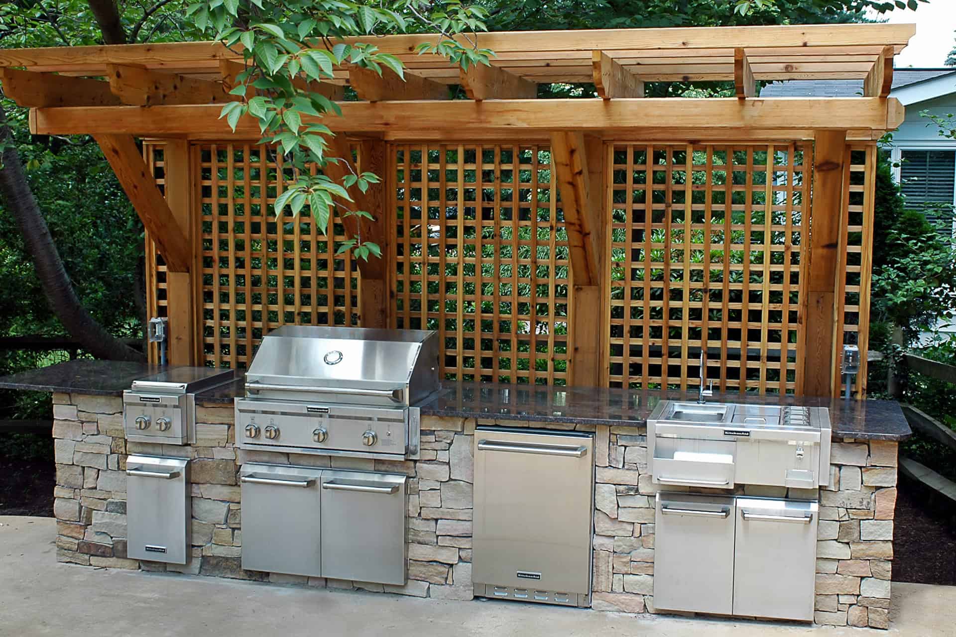 Foley After__Wilmington, DE 19807 - Outdoor Kitchen by DiSabatino Landscaping & Esposito Masonry