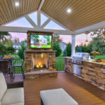 outdoor kitchen, fireplace, television or sound system