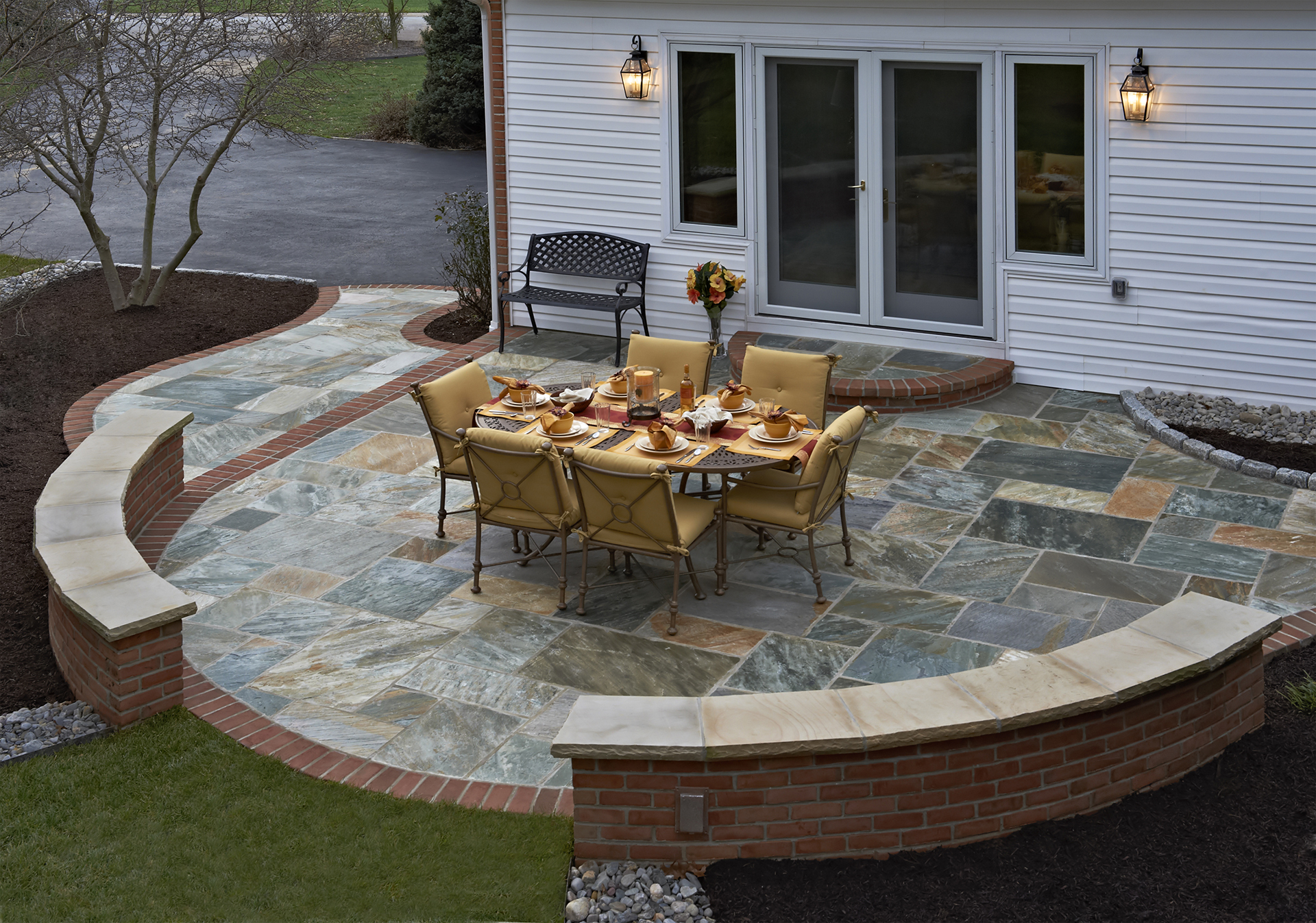 Natural stone (typically referred to as flagstone or slate)
