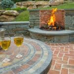 Patio with Fireplace Feature - artisan masonry